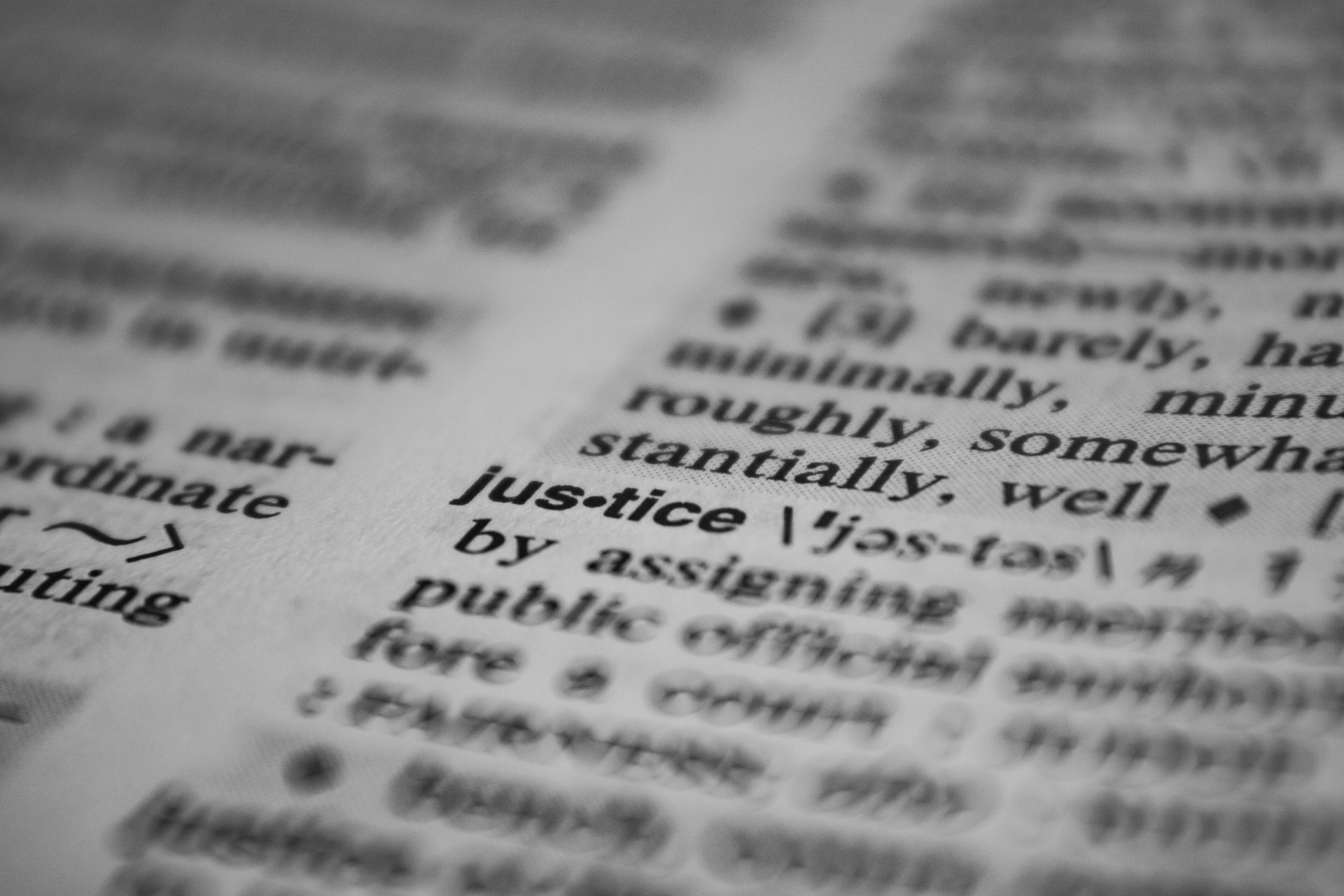 Dictionary page close-up showing a headword set in bold type