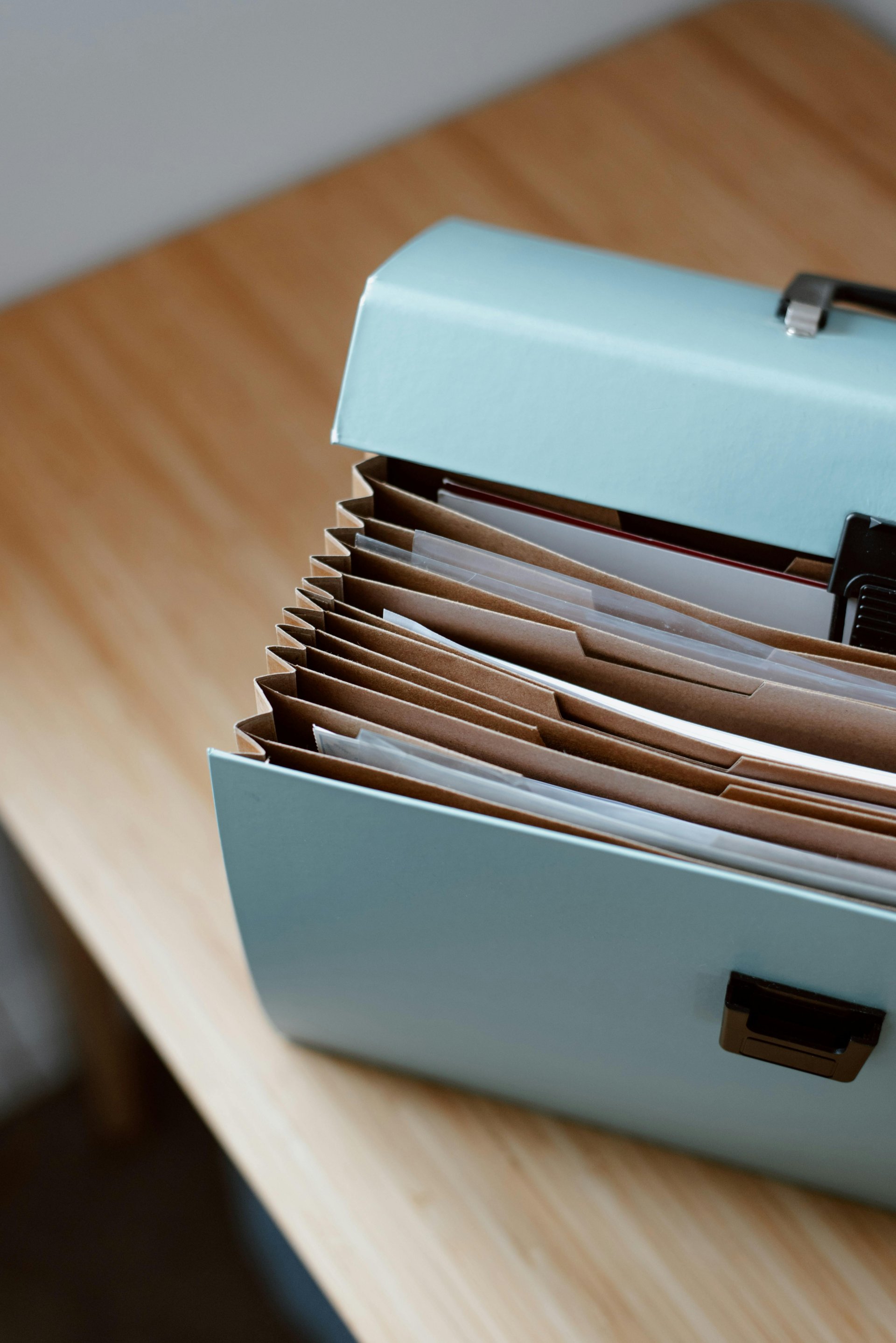 Stack of business documents on desk