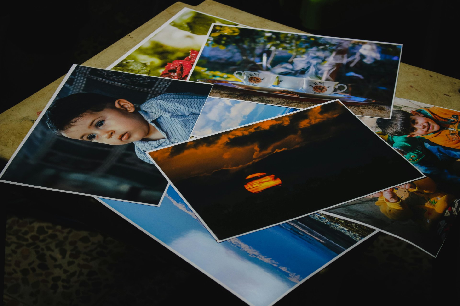 Printed photo prints spread on surface