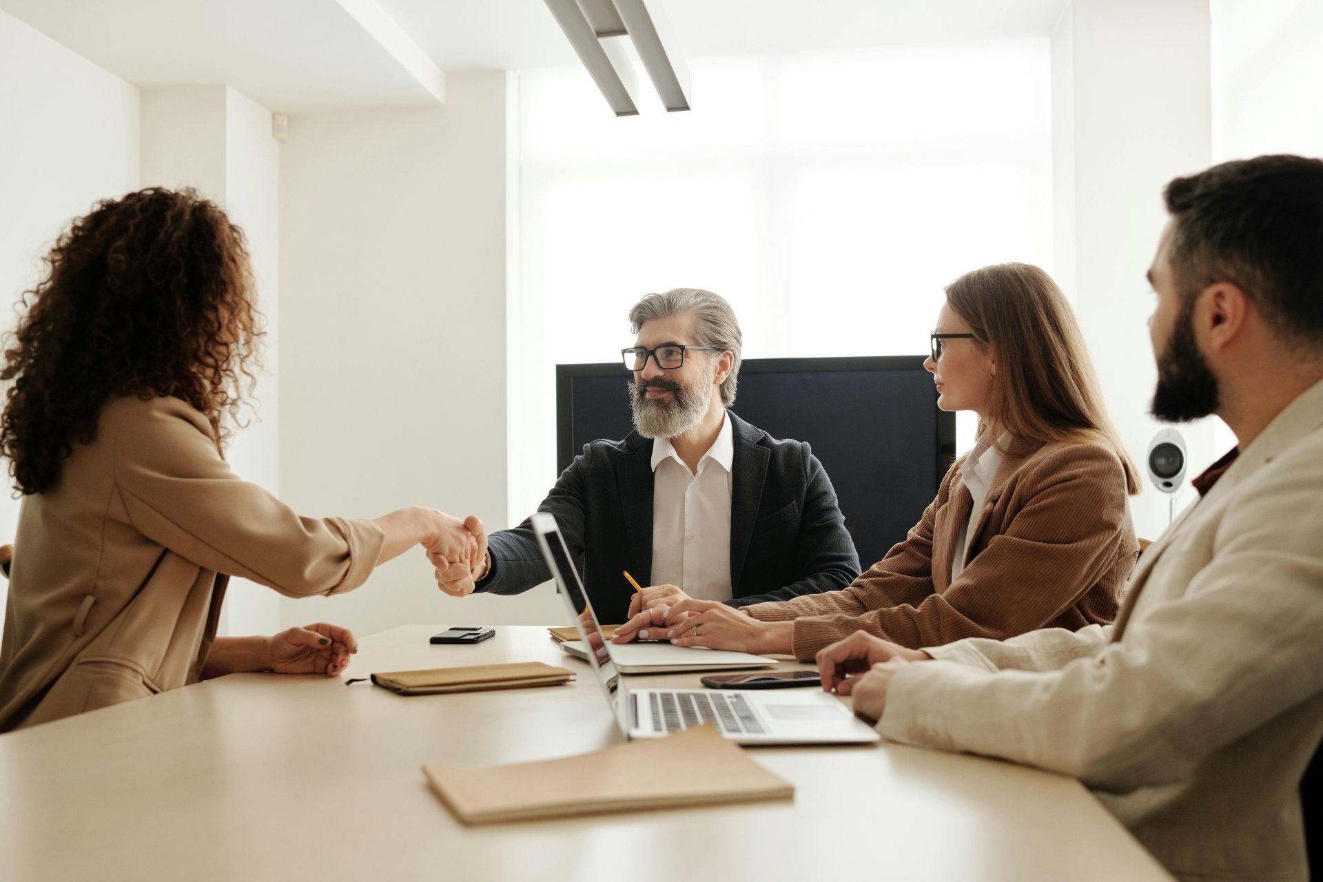 Business professionals finalizing agreement