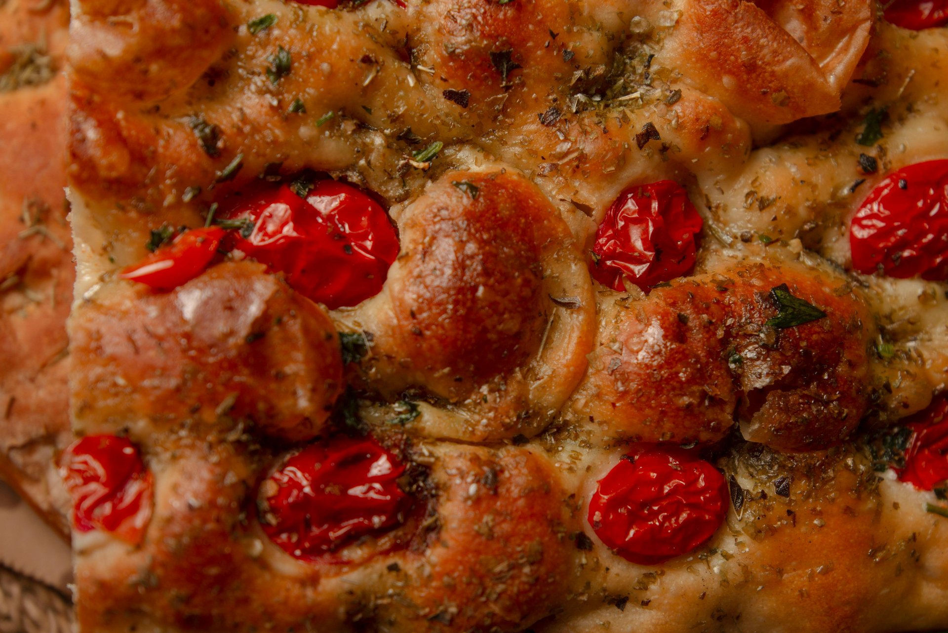 Focaccia bread topped with herbs