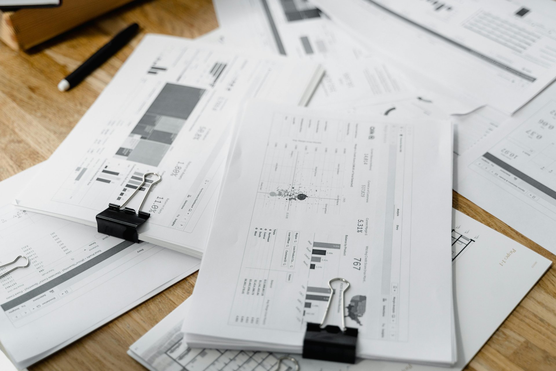 Financial documents and papers on office desk